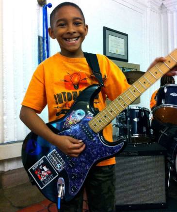 kid with guitar
