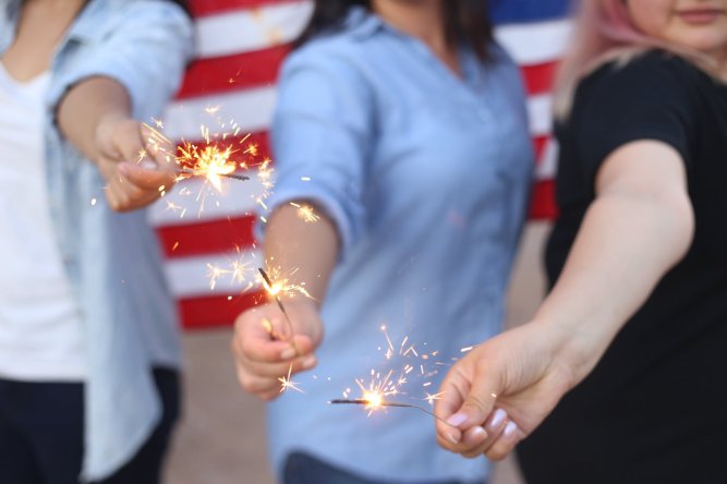 women-with-sparklers